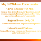 Product line description for May 2026 theme 'Citrus Sunrise' with scents listed against a sunset background.